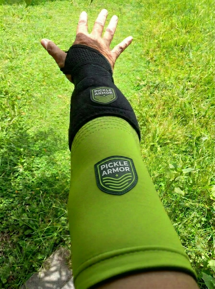 Close-up of the Pickle Armor sleeve with green anti-vibration pads at the elbow